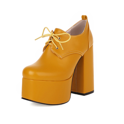 Gelbe Plateau-Loafer zum Schnüren mit klobigen Absatz-Stiefeletten mit runder Zehenpartie