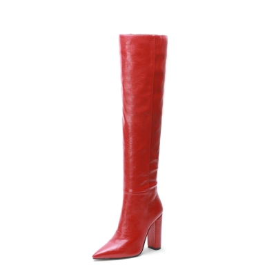 Rote, spitz zulaufende, kniehohe Stiefel mit Blockabsatz