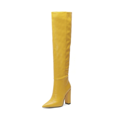 Gelbe, spitz zulaufende, kniehohe Stiefel mit Blockabsatz